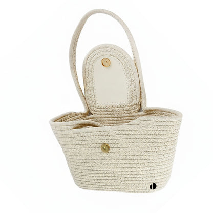 Beige woven basket with handle on a white background - Dotflakes