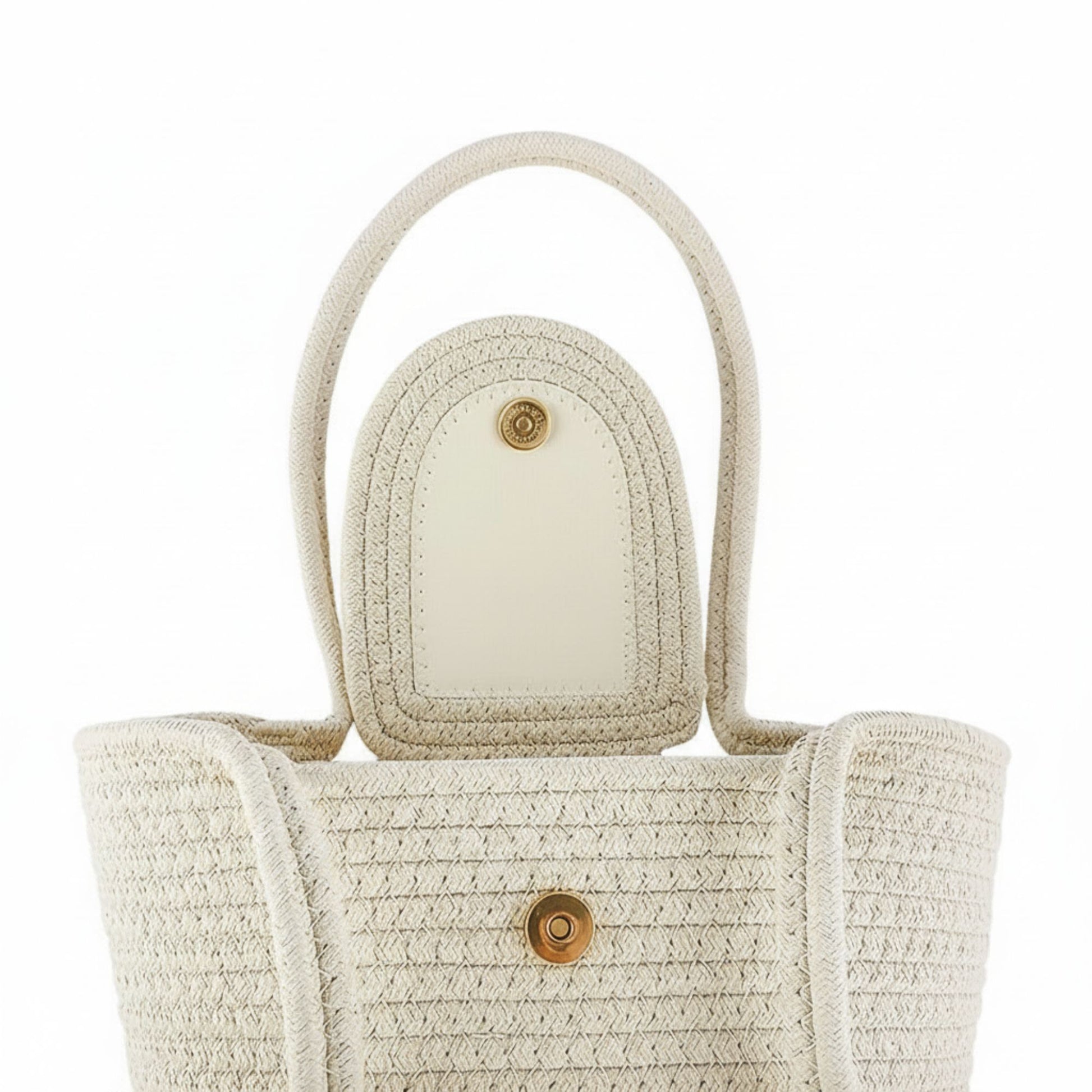 Beige woven handbag with a circular handle on a white background - Dotflakes