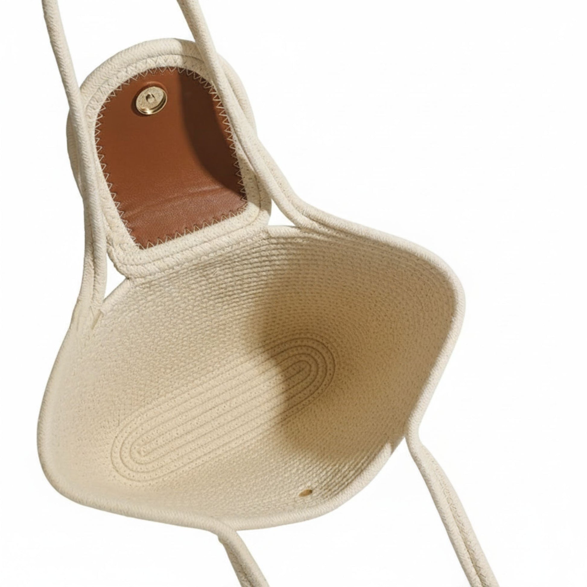 Beige woven handbag with brown interior on a white background - Dotflakes
