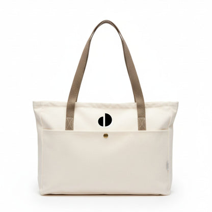 Beige tote bag with brown straps on a white background - Dotflakes